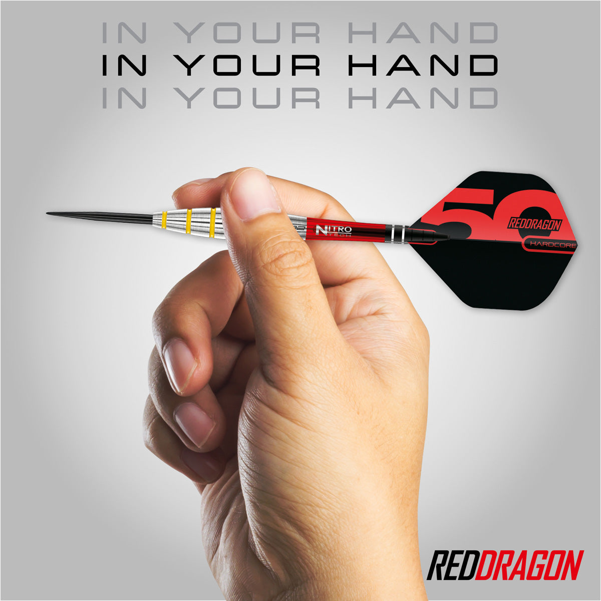 Red Dragon Chunky Stumpy 3 Steel Tip Darts in hand image showing the barrel size, grip profile, and scale when held