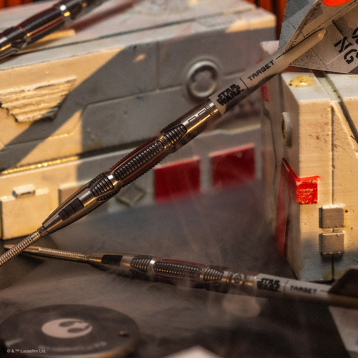 STAR WARS™ X Wing Steel Tip Darts close up image highlighting the barrel grip texture and precision machining detail