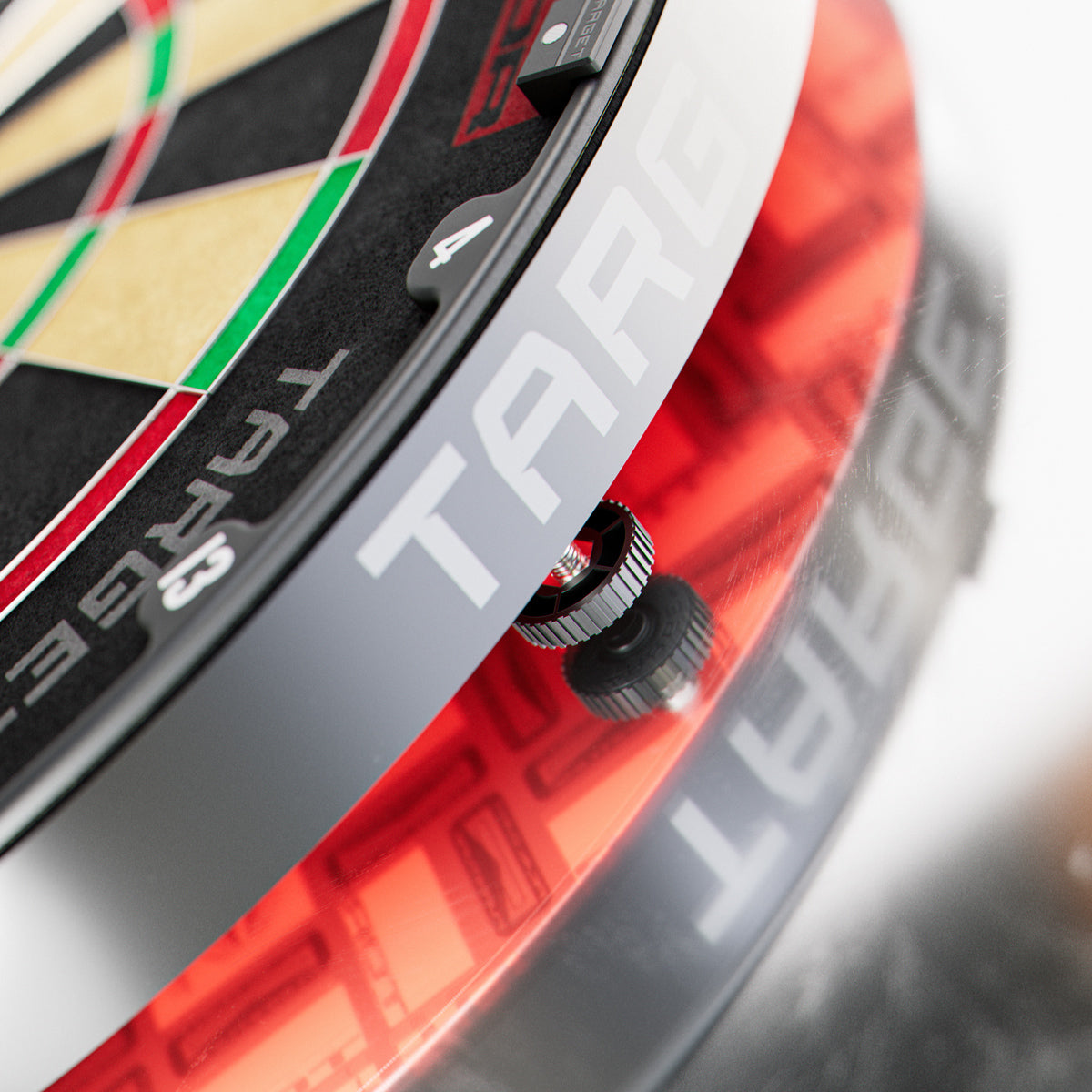 Target TOR Dartboard image highlighting the locking system to aid steadiness and noise