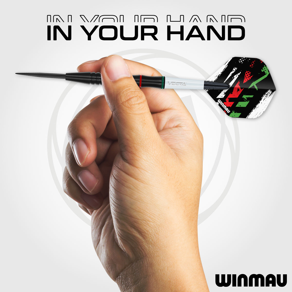 Peter Wachiuri Steel Tip Darts in hand image showing the barrel held in a player's hand to demonstrate grip position, scale, and profile shape
