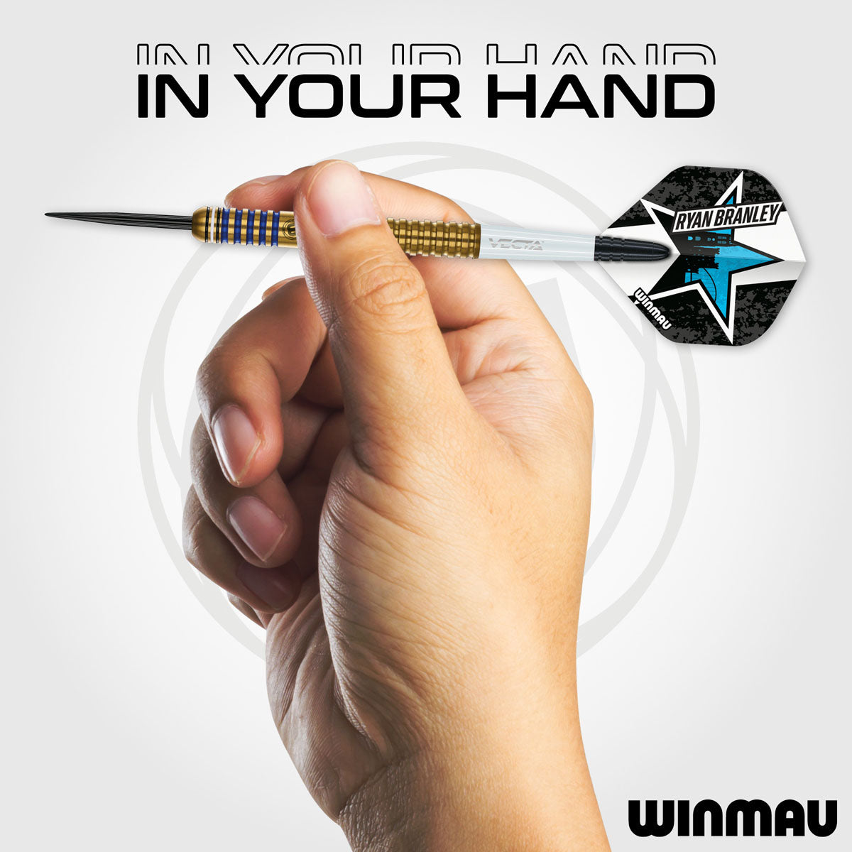 Ryan Branley Steel Tip Darts in hand image showing the barrel held in a player's hand to demonstrate grip position, scale, and profile shape