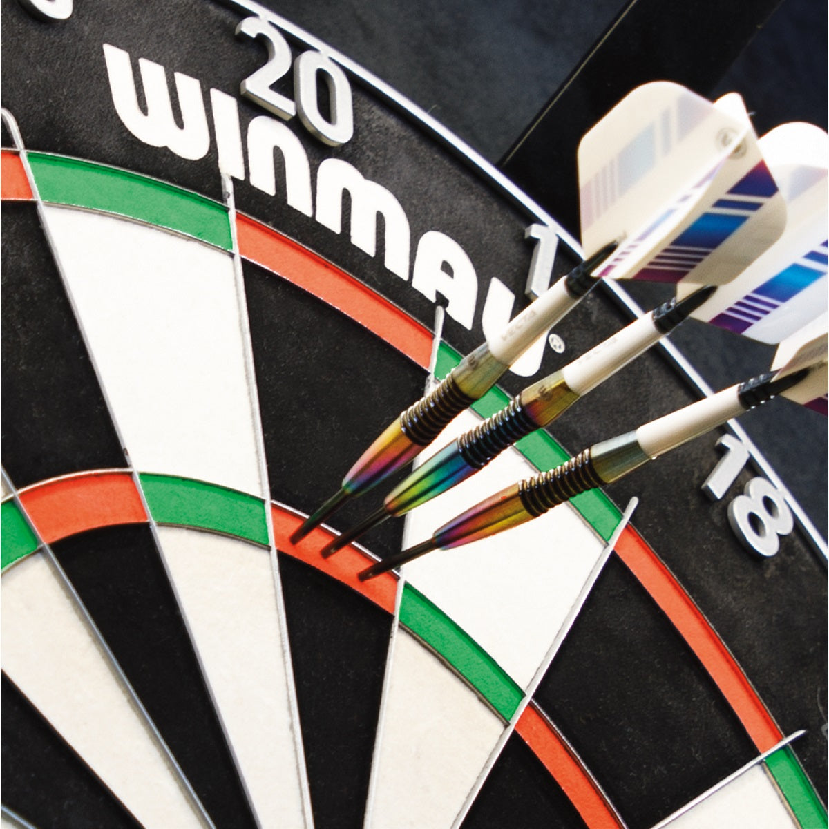 Winmau Polaris 120 Dartboard Light image showing the lighting system in use with darts thrown into the dartboard and ready for play