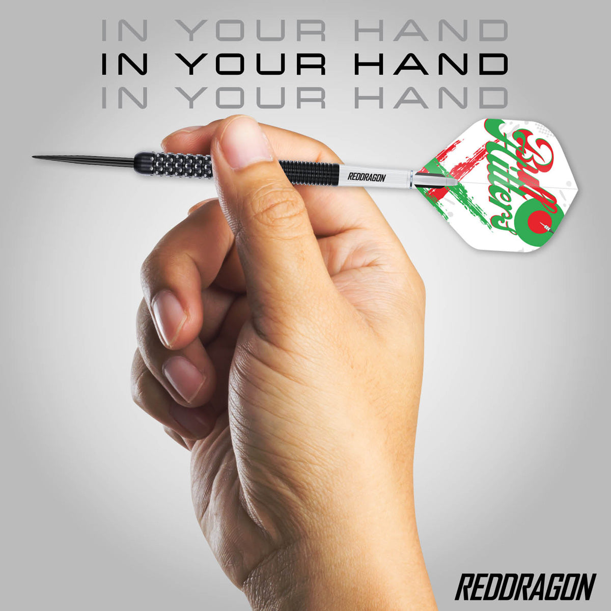 Red Dragon Bullhitters Steel Tip Darts in hand image showing the barrel size, grip profile, and scale when held