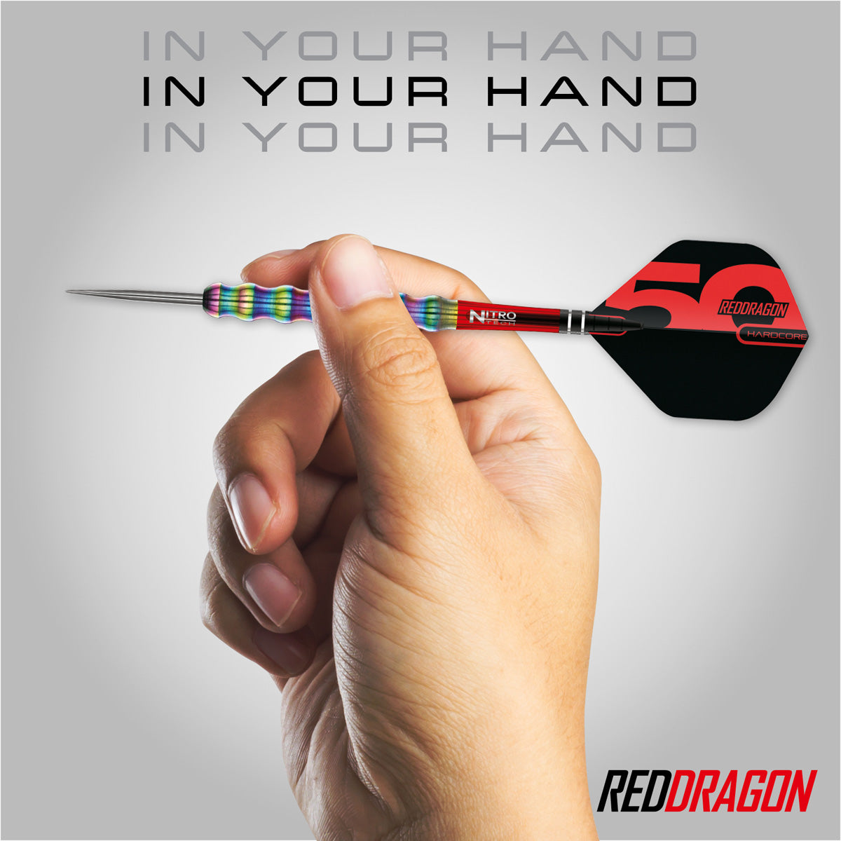 Red Dragon Shockwaves Steel Tip Darts in hand image showing the barrel size, grip profile, and scale when held