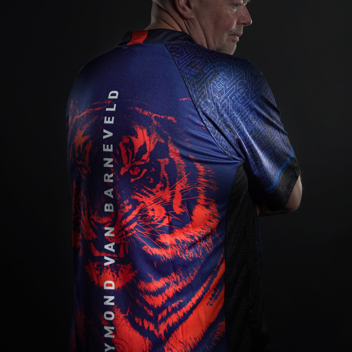 Target Raymond Van Barneveld 2025 Playing Shirt action image showing Raymond Van Barneveld wearing the shirt during competition or match play.