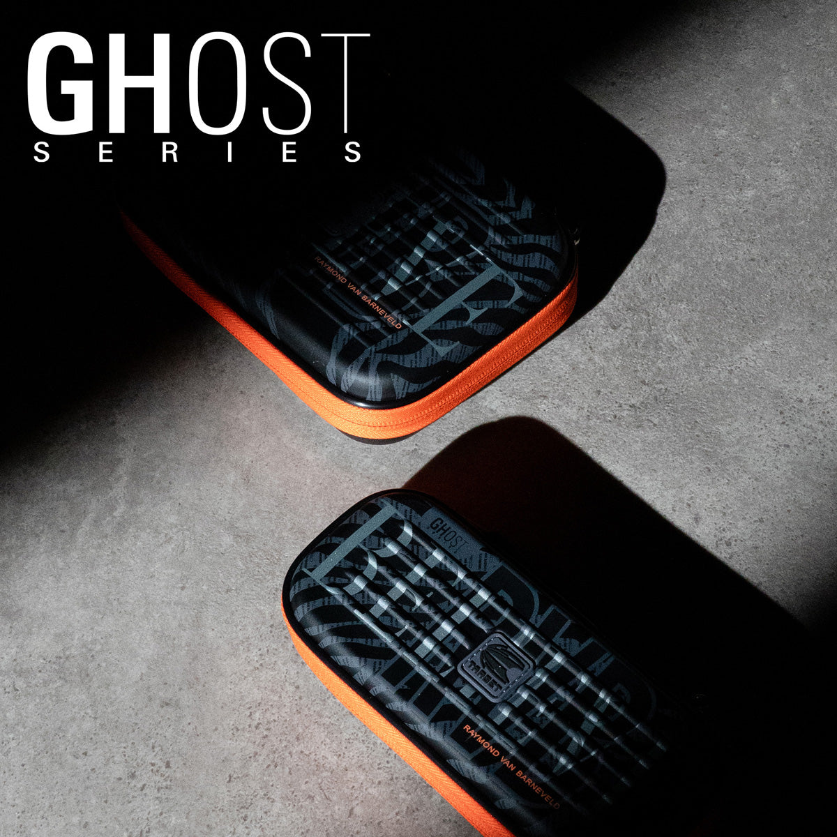 Target Raymond van Barneveld Takoma Ghost Dart Case lifestyle image showing the case in use with darts and accessories