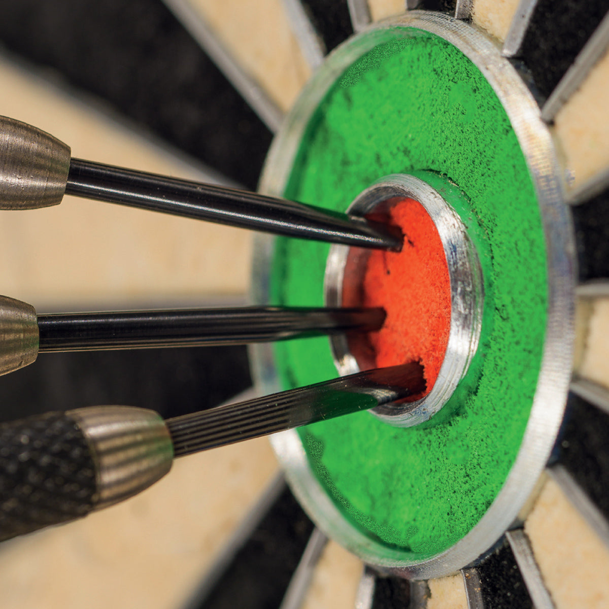 Winmau Plasma Dartboard Surround Light and Pro Line Original Black Surround Bundle image showing the system in use with darts thrown into the dartboard